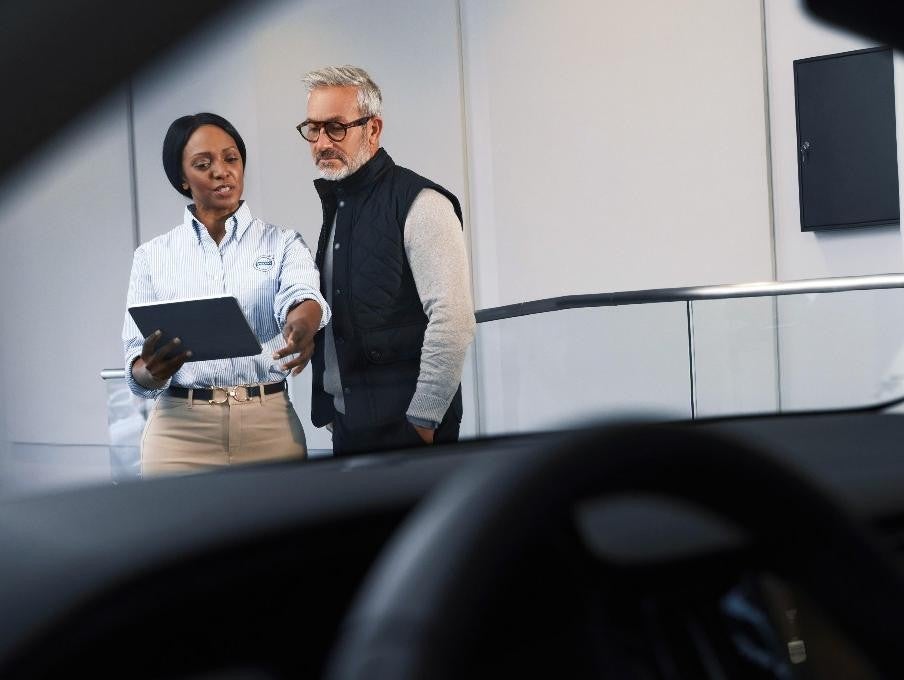 salesperson with customers Bomnin Buick GMC Nanuet in Nanuet NY